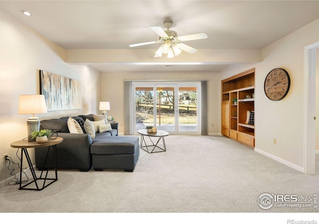 living room featuring carpet floors, recessed lighting, a ceiling fan, and baseboards