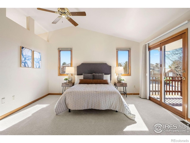 bedroom with access to exterior, multiple windows, lofted ceiling, and light colored carpet