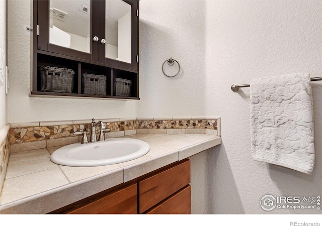 bathroom with vanity