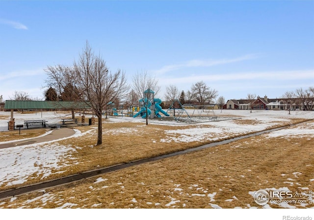 326 Riviera Ln, Johnstown, CO 80534 - yard layered in snow with playground community