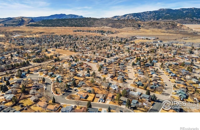 birds eye view of property featuring a residential view and a mountain view