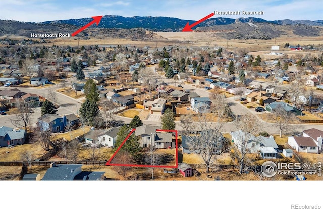 aerial view with a residential view and a mountain view