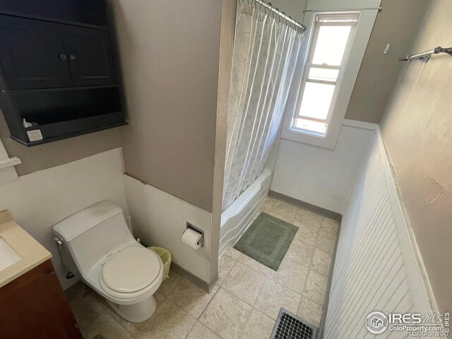 full bath with shower / bathtub combination with curtain, visible vents, vanity, and toilet