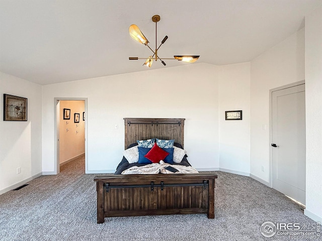 bedroom with carpet flooring, vaulted ceiling, visible vents, and baseboards