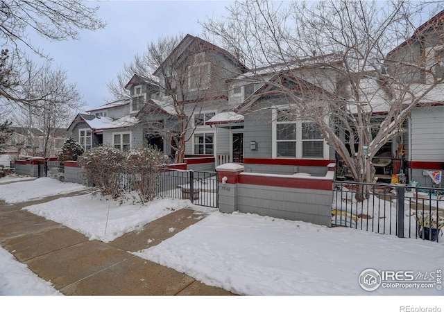 view of front of home with fence