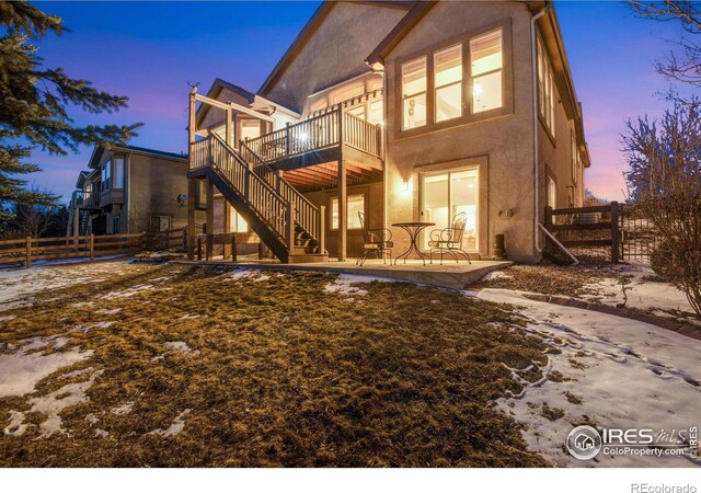 2185 Diamond Creek Dr, Colorado Springs, CO 80921 - back of house with a patio area, stucco siding, fence, and stairs