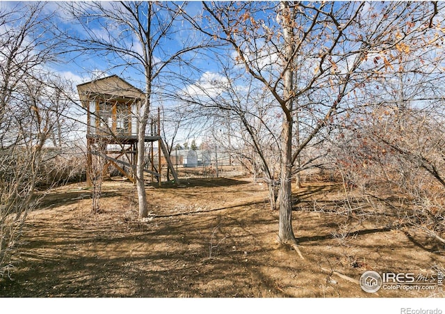 view of yard featuring playground community