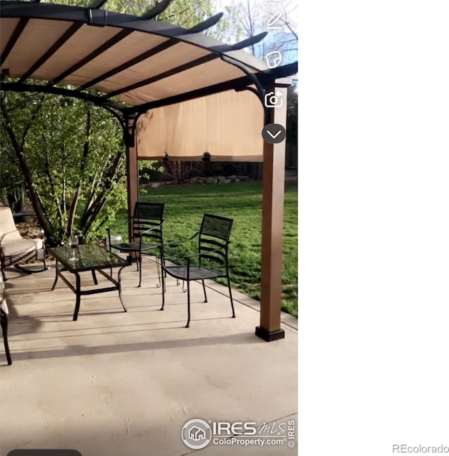 view of patio / terrace featuring a pergola