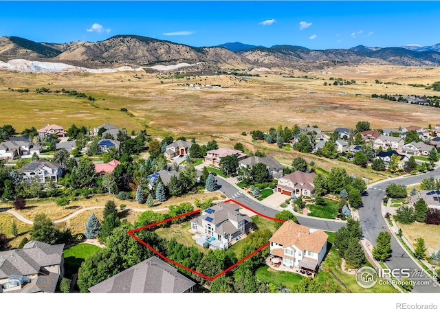 aerial view with a residential view and a mountain view