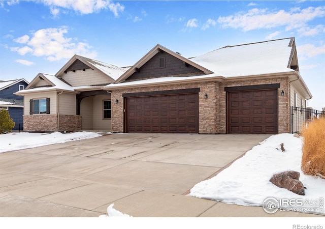 view of front of home with driveway and an attached garage