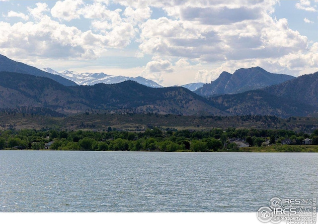 mountain view featuring a water view