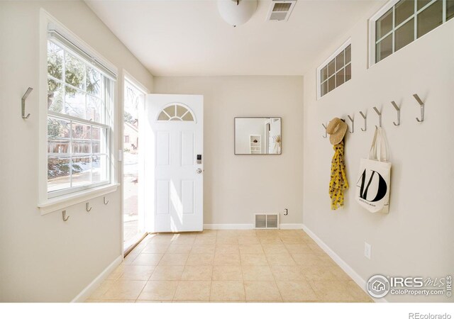 1516 Columbine Ave, Boulder, CO 80302 - tiled entrance foyer featuring visible vents and baseboards