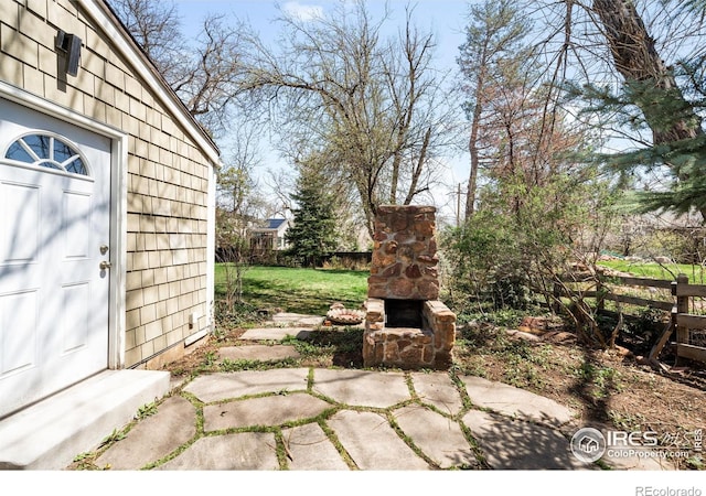 1516 Columbine Ave, Boulder, CO 80302 - view of patio featuring an outdoor stone fireplace
