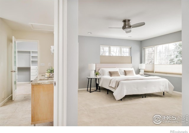 1516 Columbine Ave, Boulder, CO 80302 - bedroom with a walk in closet, ceiling fan, and baseboards