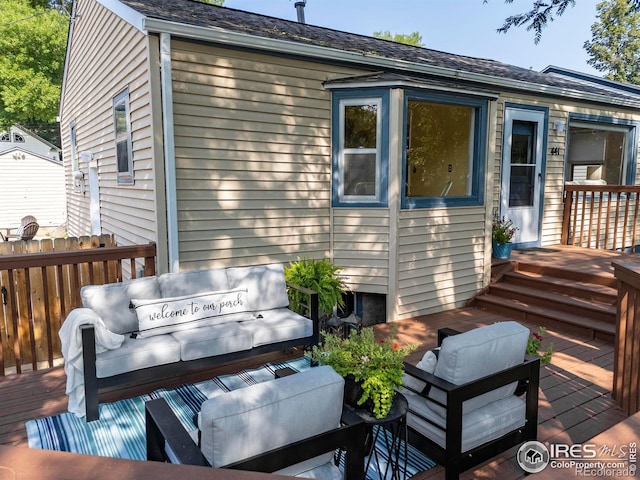 deck with an outdoor living space