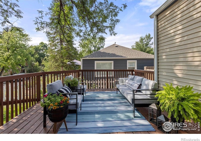 deck with an outdoor hangout area