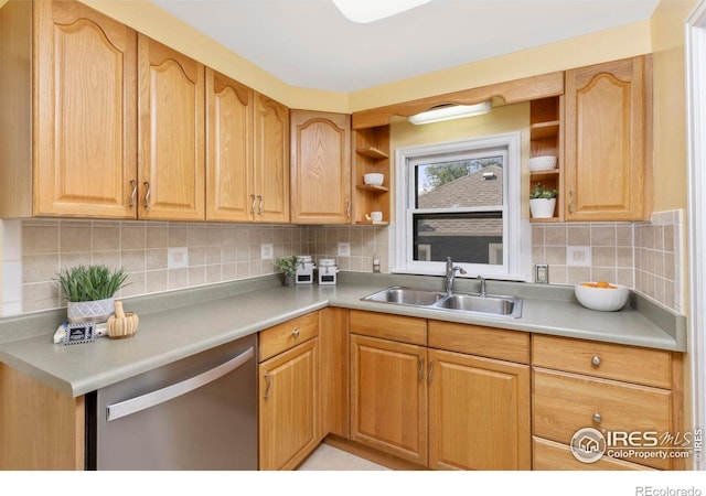 kitchen featuring light countertops, dishwasher, and open shelves