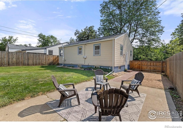 view of patio / terrace with an outdoor fire pit and a fenced backyard