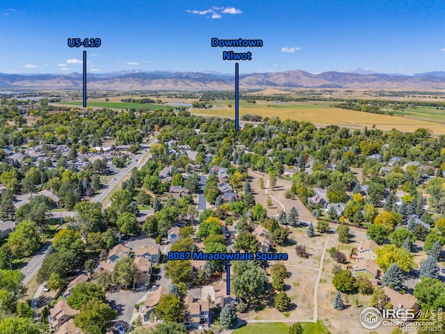 birds eye view of property featuring a residential view and a mountain view