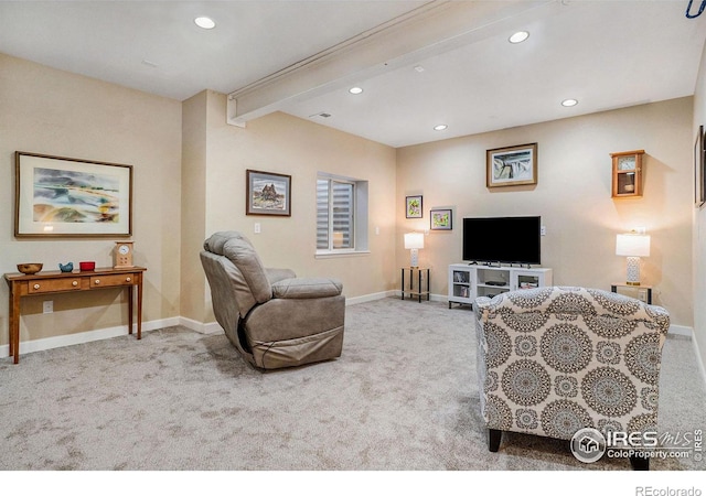 living area featuring recessed lighting, beam ceiling, and light colored carpet