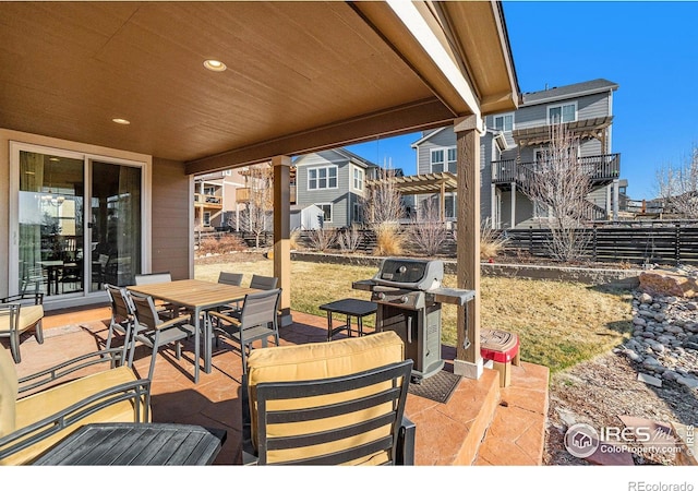 view of patio / terrace featuring outdoor dining space, grilling area, and an outdoor hangout area