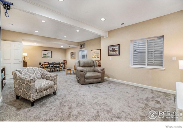 carpeted living room with beamed ceiling, recessed lighting, and baseboards