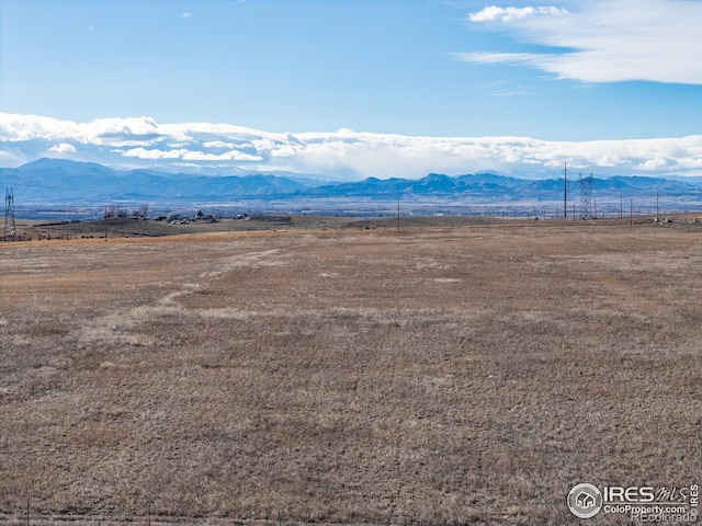 mountain view featuring a rural view