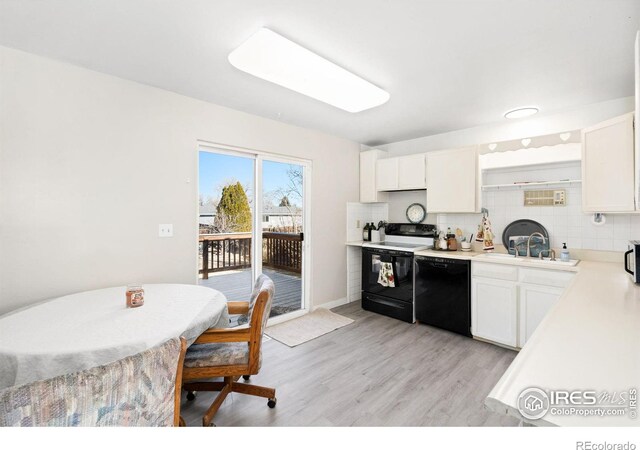 kitchen featuring range with electric cooktop, white cabinets, dishwasher, backsplash, and a sink