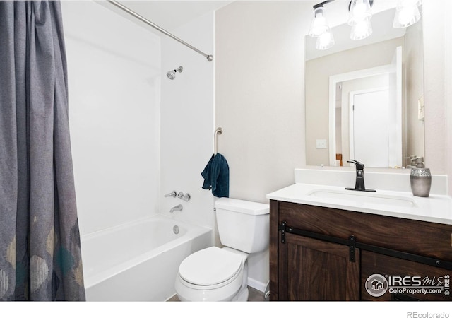 full bathroom featuring toilet, vanity, and shower / bathtub combination with curtain