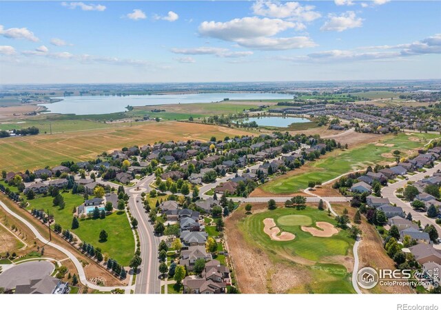 aerial view featuring a water view and a residential view