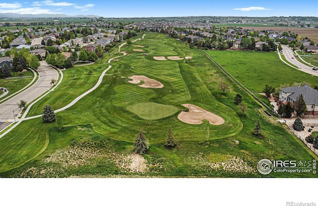 aerial view featuring a residential view and golf course view