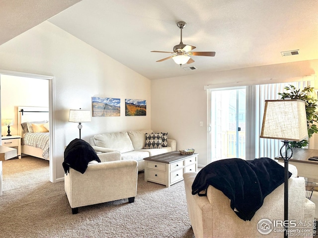 4645 Hahns Peak Dr Unit 201, Loveland, CO 80538 - living room featuring lofted ceiling, ceiling fan, and light carpet