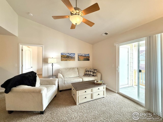 4645 Hahns Peak Dr Unit 201, Loveland, CO 80538 - living area featuring vaulted ceiling, light colored carpet, a ceiling fan, and baseboards