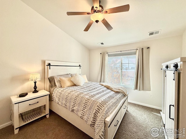 4645 Hahns Peak Dr Unit 201, Loveland, CO 80538 - bedroom with carpet floors, baseboards, lofted ceiling, and ceiling fan