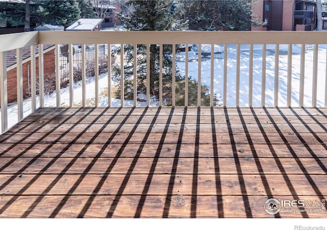 view of snow covered deck