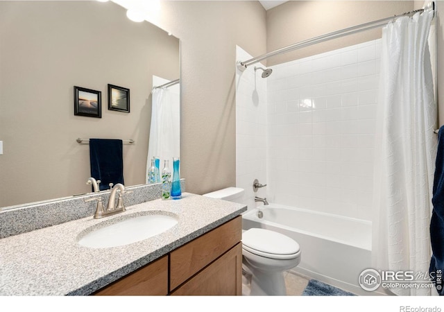 bathroom with shower / bath combination with curtain, vanity, and toilet