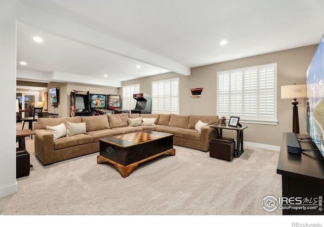 living room featuring light carpet, baseboards, beam ceiling, and recessed lighting