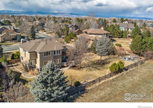 bird's eye view featuring a residential view and a mountain view