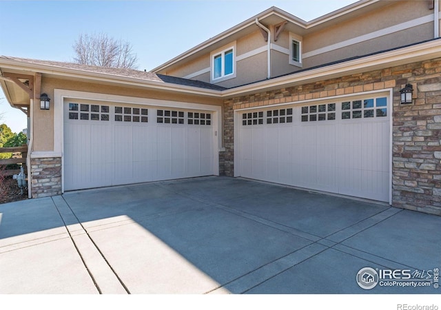 garage with driveway