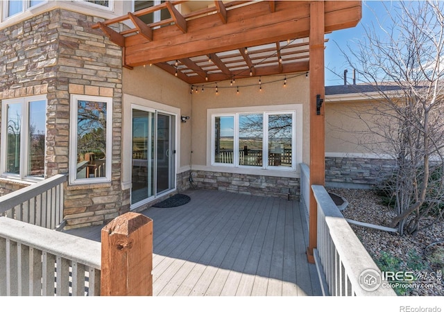 wooden terrace featuring a pergola