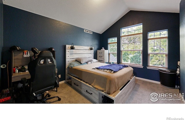 bedroom featuring lofted ceiling, light colored carpet, and baseboards