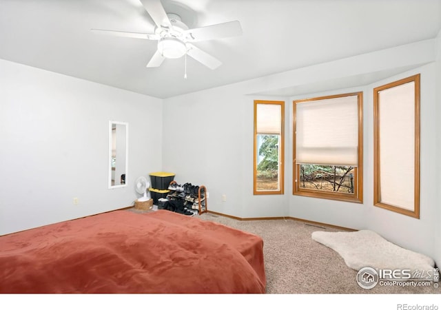 bedroom featuring carpet and ceiling fan