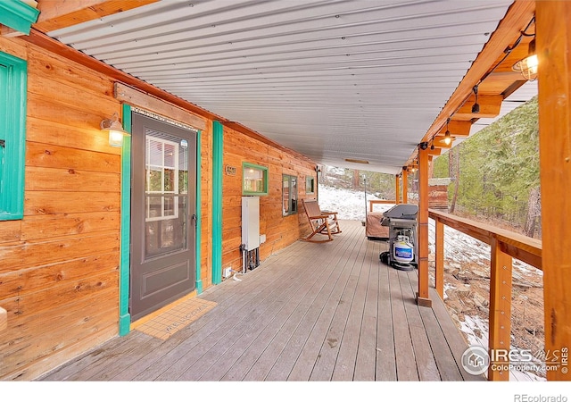 deck featuring covered porch