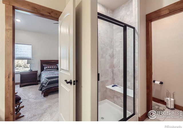 ensuite bathroom featuring a shower stall and ensuite bath