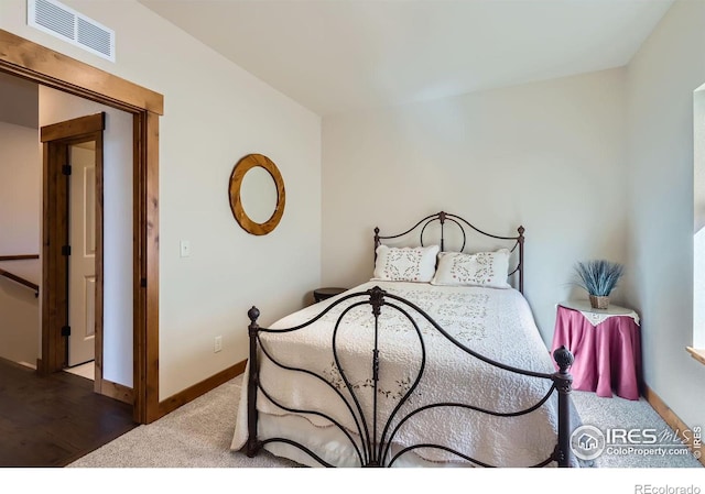 bedroom featuring carpet, baseboards, and visible vents