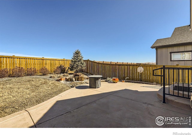 view of patio with a fenced backyard