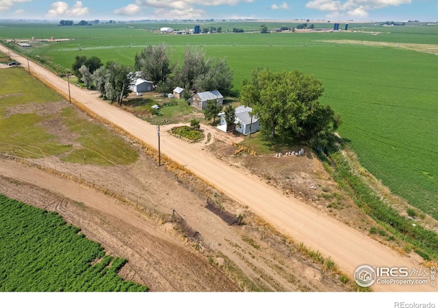 birds eye view of property featuring a rural view