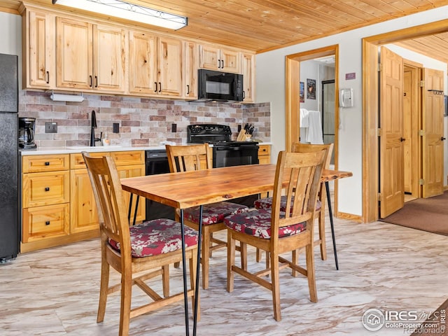 dining area featuring wood ceiling