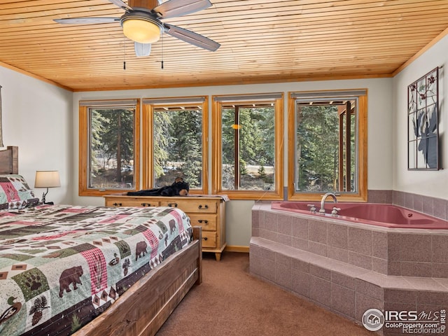 bedroom with wood ceiling and carpet flooring