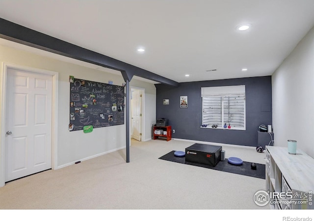 workout area with baseboards, recessed lighting, and light colored carpet